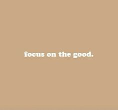 the words focus on the good are written in white letters against a tan background with a black and white border