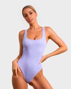 Solid Color High Stretch T-back Swimwear, Contoured Seamless Bodysuit Shapewear, Fitted Seamless T-back Bodysuit, Fitted T-back Seamless Bodysuit, Solid High Cut Bodysuit For Swimming, Sculpting Solid Swimwear With Built-in Bra, Summer Shapewear For Swimming, Smoothing Contoured Bodysuit, High Cut Smoothing Bodysuit