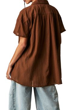 Feel the breeze in this floaty cotton shirt designed in an oversized fit with vented sides. 31" length (size medium) Spread collar Short sleeves 100% cotton Machine wash, tumble dry Imported Casual Brown Summer Blouse, Flowy Cotton V-neck Blouse, Casual Brown Cotton Blouse, Oversized Brown Cotton Blouse, Flowy Button-up Summer Tops, Brown Cotton V-neck Shirt, Trendy Brown Cotton Blouse, Summer Flowy Button-up Blouse, Breezy Cotton Top For Day Out