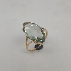 You can choose your own gem in my store. Let me know if you would like to see options Details of the ring Gem: Green Amethyst Gem size & shape: 20x10 mm and Marquise Center Gem weight: 5.85 carat Gold purity: 14K (58.33% approx.) Gold weight: 1.37 grams total weight of ring: 2.54 grams Fine briolette cut Green Amethyst marquise shape gemstone ring set in solid 14K yellow gold. The Gold purity is guaranteed and it comes with authentic 14 kt gold hallmark. Since these Rings are handmade, Size Luxury Green Amethyst Ring, Luxury Green Amethyst Ring For Anniversary, Yellow Gold Green Amethyst Ring For Anniversary, Anniversary Green Amethyst Ring In Yellow Gold, Elegant Green Amethyst Ring As A Gift, Elegant Green Amethyst Ring For Gift, Elegant Yellow Gold Green Amethyst Rings, Fine Jewelry Green Amethyst Ring, Luxury Green Amethyst Gemstone Ring