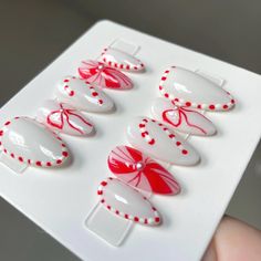 Press On Christmas Nails, Candy Cane Almond Nails, Candy Cane Nails Christmas, Candy Cane Nails Short, French Tip Christmas Nail Ideas, Holiday Nails Gel, Christmas Nails Red And White, Goth Christmas Nails, Christmas Candy Cane Nails