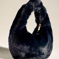 Anthropology, Mini Faux Fur Hobo Bag Chic Black Pouch Hobo Bag, Chic Black Hobo Bag In Pouch Shape, Black Hobo Bag With Zipper For Fall, Chic Evening Shoulder Bag With Faux Fur Lining, Fall Black Hobo Bag For On-the-go, Black Bags With Gold-tone Hardware, Chic Rectangular Shoulder Bag With Faux Fur Lining, Black Rectangular Bag With Faux Fur Lining, Chic Shoulder Bag With Faux Fur Lining