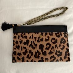 J Crew Leather Leopard Print Wristlet. Nwot. Black Leather And Calf Hair Material With Black Tassel And Bronze Chain Metal Wrist Strap Which Is Removable. Has Outside Pocket For Cell Phone With Snap Magnetic Closure. Measures 9 By 6. Chic Brown Wristlet For Everyday Use, Trendy Brown Rectangular Wristlet, Elegant Brown Wristlet For Evening, Elegant Brown Evening Wristlet, Brown Clutch With Wrist Strap For Daily Use, Elegant Brown Wristlet For Daily Use, Elegant Brown Clutch With Wrist Strap, Trendy Brown Clutch, Trendy Brown Wristlet For Travel