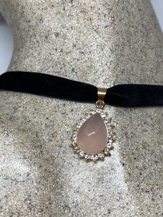 Vintage Rose Quartz Choker gold finished Pendant Necklace Over an inch long Hangs on a velvet ribbon Can be worn on a chain All jewelry is shipped free in the US in a nice gift box. Check out our over a THOUSAND great reviews Quartz Choker, Emo Aesthetic, Cool Piercings, Choker Gold, Streetwear Grunge, Vintage Rose, Quartz Rose, Velvet Ribbon, Vintage Roses