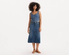 Swap out your everyday jeans for our High-Rise A-Line Decon Skirt. We cut this one with an easy high rise, a flattering A-line midi silhouette and deconstructed denim design. Your favorite jeans;in skirt form Cut with a flattering A-line midi silhouette With an easy high rise Finished with a deconstructed denim design Crafted with classic non-stretch denim Levi's Spring Denim Skirt, Mid-rise Denim Skirt For Summer Workwear, Fitted Levi's Denim Skirt In Medium Wash, High Rise Levi's Denim Skirt For Summer, Fitted Levi's Denim Skirt, Levi's High Waist Denim Skirt For Summer, Levi's High Rise Denim Skirt For Summer, Levi's Cutoff Denim Skirt For Spring, Levi's Cutoff Denim Skirt For Summer