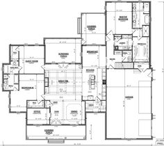 the first floor plan for a home with two master suites and an attached kitchen area