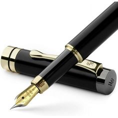 two black and gold fountain pens sitting next to each other