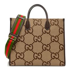 This is an authentic GUCCI Monogram Jumbo GG Textured Dollar Calfskin Web Tote Bag in Camel, Ebony, and New Acero.This shoulder bagis crafted of oversized monogram fabric in light brown. The bag has dark brown leather trim with sturdy top handles with matching trim. This handbag opens with a hook closure to a beige fabric interior with a zipper pocket. Brown Light Luxury Shoulder Bag For Shopping, Light Luxury Brown Shoulder Bag For Shopping, Brown Gucci Bag For Everyday Use, Brown Gucci Bag For Daily Use, Gucci Brown Bag For Daily Use, Gucci Brown Top Handle Bag, Brown Gucci Top Handle Bag, Gucci Brown Shoulder Bag With Top Carry Handle, Gucci Brown Top Handle Shoulder Bag