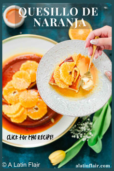 a person eating food from a plate on top of a table with orange slices and sauce