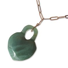 "20.5\" long, adjustable wear it any length you want!  lead and nickel free     Green Aventurine's essence is that of spring bursting forth after a long, dark winter. It assists us in finding hope, joy and optimism in daily life. Aventurine helps us to release attachments to past events and to embrace change, growth and renewal. Key words: Vitality, growth, confidence Chakras: Heart Elements: Water, Earth Zodiac Signs: Virgo, Taurus Number: 3 We do our best to choose each stone carefully and purposefully for every piece. Each piece of jewelry will come in a pouch or box for it's protection and storage or to be ready to give as a gift. Our gemstone jewelry are all original designs by Lisa Beth and LDE Affinity Jewelry. They are hand crafted with passion and love in our Southern California s Green Aventurine Gemstone Crystal Necklace, Green Aventurine Gemstone Necklace, Green Aventurine Crystal Necklace Gift, Green Heart-shaped Gemstone Necklace, Green Aventurine Beaded Hand-strung Necklace, Heart Lock, Gemstone Choker, Carved Heart, Beaded Necklace Designs