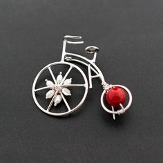 Embrace your passion for cycling with our stunning sterling silver brooch, designed in the delightful shape of a vintage bicycle that's perfect for big moms and adventurous spirits alike. This exquisite piece not only makes a heartfelt gift for cyclists and vintage lovers but also adds a touch of charm and nostalgia to any outfit--click to secure this unique treasure for yourself or a loved one today! ✈️ Free UPS Express shipping to USA, EU countries & Canada - delivery in just 2 days! Totally h Bicycle Jewelry, Big Mom, Front Back Earrings, Vintage Bicycle, Vintage Lovers, Sterling Silver Brooch, Coral Jewelry, Mom Jewelry, Button Jewelry