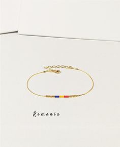 Flag of Romania bracelet. Motherland flag jewelry. Gift for the friend from Romania. Country of origins bracelet.   This listing is for one bracelet. The 1st image shows the bracelet with the flag of ROMANIA. Bracelets with the flag colors of many countries, territories, regions, cities, universities, colleges, parties, communities, etc. are also available. Please ask us if this is possible before ordering. The chain, spacer beads and closure are available in gold tone (default) or silver tone ( Flag Of Romania, Romanian Flag, Romania Flag, Flag Bracelet, Custom Flags, Flag Colors, The Flag, Bracelet Gift, Spacer Beads