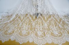 "This lightweight Chantilly lace dress fabric has scalloped borders top and bottom, Soft Exquisite Chantilly lace wedding dress fabric for the most beautiful bridal gowns. Listing is for 1 yard. ( Additional quantities are available ) Width about: 59\" (150 cm) Use for dress supplies, costume fabric, dresses, gift package, bags decoration, party dress, curtains, skirt bottoming, home decor and other projects you could imagine. Sample is available, Click here to order https://www.etsy.com/listing Chantilly Lace Dress, Chantilly Lace Wedding Dress, Dress Curtains, French Chantilly Lace, Victorian Gown, Bridal Clutch Bag, Wedding Alters, Lace Bonnet, Wedding Applique