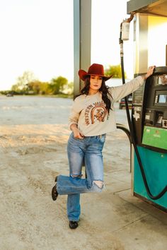 Saddle up and ride into style with our Western Valley Ranch Raw Hem Graphic Sweater! This tee features a rustic and charming design complete with a horseshoe and a cowboy on horseback. Made from soft, high-quality fabric, this tee is as comfortable as it is stylish. Made in the USA Outfit Vaquero, Real Turquoise Jewelry, Ranch Hand, On Horseback, Graphic Sweaters, Real Turquoise, Plus Size Shopping, Dress Romper, Long Sweaters