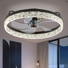 a living room with a round light fixture