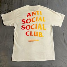 “Indoglo” Tee From Anti Social Social Club. Size Is Medium. White With Warm Red/Yellow Lettering. Purchased In July. I’m Putting On Some Weight And I Just Can’t Pull Of A Medium Anymore (6’ ~195lbs). Oh Well. Also Selling The “Blind Games” Shirt On Another Posting. Thanks For Checking This Out. Look At My Other Listings, Too. I Offer Good Savings For Bundling! Anti Social Social Club White Shirt, Yellow Graphic Design Tops For Summer, Yellow Cotton Tops With Graphic Design, Yellow Casual Tops With Graphic Design, Casual Yellow Tops With Graphic Design, Casual Yellow Top With Graphic Design, Multicolor Letter Print Shirt For Streetwear, Yellow Screen Print Shirt For Streetwear, Basic White Tops With Back Print