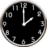 a black and white clock with numbers on the face is showing eleven o'clock