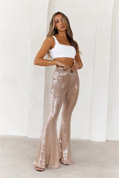 Length from waist to hem of size S: 110cm. Pants.  Lined. Model is a standard XS and is wearing size S. True to size. Stretch. Mesh. Elastic waist.   Wide-leg. Clear sequins. Elastic waistband. Slip on. Cold hand wash only. Polyester/Spandex.   Lovely, it's time to party in the Grooving Sequin Wide Leg Pants. Featuring sparkly, clear sequins and a statement wide-leg design. Style with a corset and heels for all the attention. Glamorous Stretch Full-length Pants, Glamorous Stretch Full Length Pants, Glamorous Full-length Stretch Pants, Glamorous Stretch Straight Bottoms, Glamorous Stretch Pants For Spring, Glamorous Stretch Straight Pants, Glamorous Stretch Trousers, Non-stretch Party Dress Trousers, Glamorous Fitted Straight Pants