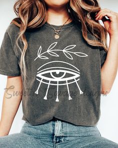 Evil Eye Shirt Boho Shirts Unique Retro T-shirts Hippie - Etsy Trendy Cotton Festival T-shirt, Bohemian Cotton T-shirt With Graphic Print, Hippie Cotton T-shirt With Graphic Print, Bohemian Cotton Tops With Graphic Print, Spring Grunge T-shirt With Funny Print, Cotton Hippie T-shirt With Graphic Print, Cotton Hippie T-shirt With Screen Print, Hippie Style Screen Print T-shirt, Hippie Style Short Sleeve Top With Screen Print