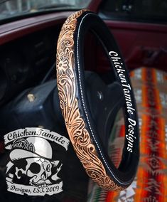 a steering wheel cover with a skull on it