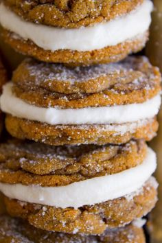 a stack of cookies with white frosting on top