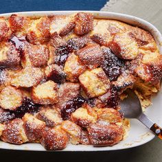 a dessert dish with powdered sugar and jelly