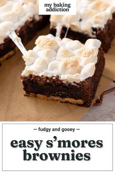 an advertisement for brownies with marshmallows on top and the words fudge and gooey easy s'mores brownies