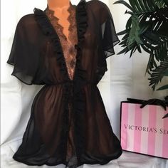 Nwot Victoria's Secret Rare Limited Edition Designer Collection Black Chiffon And Lace Kimono Robe. Ties In The Front And Back About 30in Long Size- Small No Rips, Stains Or Tears. Only "Defect" Is Light Fading On The Tag From When It Was Taken Out Of Storage And Cleaned. Otherwise In Excellent Condition Sales Final Victoria's Secret Black Sheer Sleepwear, Black Sheer V-neck Sleepwear, Chic Black Sleepwear With Lace Trim, Victoria's Secret Black V-neck Sleepwear, Black V-neck Sleepwear By Victoria's Secret, Elegant Sheer Sleepwear By Victoria's Secret, Elegant Black Sheer Sleepwear, Chic Black Sleepwear For Evening, Chic Black Evening Sleepwear