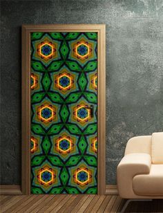 an open door in a room with a green and yellow pattern on it's side