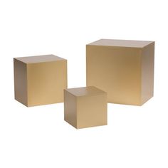 three square boxes sitting next to each other