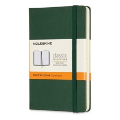 a green notebook with an orange stripe on the front and white pages, sitting in front of a white background