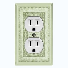 an electrical outlet cover with two outlets