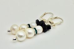 If you love snowmen, you will love these unique snowmen earrings.  The earrings were lovingly made by combining white beads with black Swarovski crystal beads that make up the hat and scarf.  I love to wear snowmen.   These are great not just for the holiday season, but to brighten those long winter days. Lots of people collect snowmen and these earrings will bring joy to those collectors!  If these earrings are a gift,  All of my jewelry is shipped in eco frieindly craft boxes that are wrapped Elegant White Earrings For Holiday, Elegant White Holiday Earrings, White Turquoise Jewelry, Snowmen Earrings, Craft Boxes, Winter Earrings, Jewelry Holiday, Art Jewelry Contemporary, Turtle Earrings