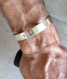 A perfect adjustable bracelet for men. made of flexible sterling silver by hand. Eco friendly. we use recycled Silver. A great idea for a personalized gift. In both sides we engrave a letter of your choosing. It can be him and yours initials, or if you buy it for yourself- your initials. Each one is a custom order. If you want it to be perfect, please measure your arm just above the wrist bone. If it is more convenient to measure in centimeters you are welcome to do so and write it in the NOTE F Silver Minimalist Wristband For Father's Day, Minimalist Silver Bracelets For Father's Day, Adjustable Modern Silver Name Bracelet, Father's Day Silver Wristband, Silver Cuff Jewelry For Father's Day, Mens Silver Cuff Bracelet, Etsy Bracelets, Mens Cuff Bracelets, Funky Rings