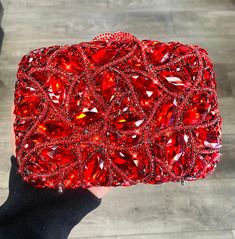 ✨Add some sparkle to your style with this lovely crystal rhinestone clutch. It makes a beautiful statement piece. 100% handmade. Crystals shine beautifully in any light💖. You're sure to catch eyes and get compliments wearing this cute bag! Suitable for any event or night out. Great for a gift idea🎁. Extra crystals & rhinestones are included.  *Silver interior  *Removable chain  *Snap lock closure  (Please allow 7-10 business days for shipping & handling) All sales are final. Items are quality checked before shipment. If received with any defective problems, please contact us within 7 days for repair. Brown Clutch, Beaded Clutch Bag, Prom Girl Dresses, Red Clutch, Envelope Clutch Bag, Rhinestone Clutch, Quilted Wallet, Snap Lock, Red Abstract