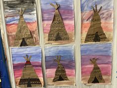 four native american teepees are displayed on the wall in front of children's artwork