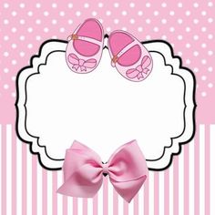 a pink card with baby shoes and a bow