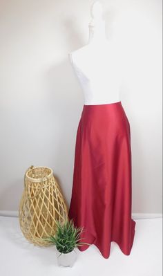 "Vintage 1990s Burgundy Red Silky Shiny A Line Lined Formal Full Length Maxi Long Fancy Evening Skirt Bottom Sz Medium This skirt is used but in good condition. Has no rips, tears, staining and hardly any wear and tear. Appropriate for any evening, or formal occasion. Fully lined. Sz 6 Small but runs big. Kept in smoke and pet free home. Measurements: Waist: 28\" Hips: 44\" Top to bottom: 44\" (Measurements are taken across item laying flat and are then doubled.) Thanks for looking! Domestic Shi Full Length Red Party Skirt, Fitted Red Maxi Skirt With Lining, Red Full-length Maxi Skirt For Summer, Red Elegant Full-length Maxi Skirt, Elegant Red Full-length Maxi Skirt, Elegant Full Length Red Maxi Skirt, Elegant Fitted Red Maxi Skirt, Red Fitted Full Maxi Skirt, Red Fitted Full Skirt