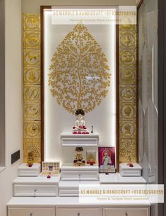 a white and gold display case in a room