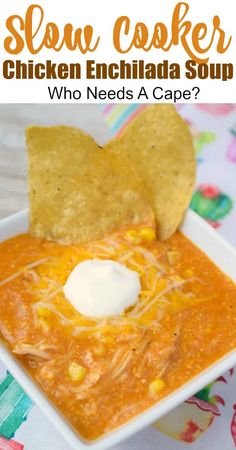 a bowl of chicken enchilada soup with tortilla chips on the side