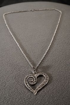 I am offering you these very classy vintage heart shaped pendant charm and necklace chain. A stunningly beautiful piece with the following features: It is rendered in sterling silver (stamps) and is embellished with several round shaped genuine marcasite stones. It measure approx. 1 3/4 inch in length, by app. 1.5 inch in width. The necklace chain is a sturdy rolled rope link , that measures a very versatile 18 inches in length. They weigh app. 9 grams. There is tons of sparkle and shine with th Elegant 925 Stamped Heart Pendant Necklace, Elegant Open Heart Necklace For Jewelry Making, Chain Heart, Classy Vintage, Heart Shaped Pendant, Heart Shape Pendant, Vintage Heart, Victorian Style, Necklace Chain