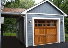 a garage with two doors on the side and one door open to let in light