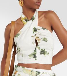 Floral Linen Halterneck Top in White - Erdem | Mytheresa Chic Linen Halter Neck Top, Chic Linen Halter Top, Fitted Linen Halter Neck Top, Fitted Linen Halter Top, Chic Floral Print Halter Top, Beach Halter Top In Linen, Spring Linen Halter Neck Tops, White Floral Print Halter Top, Spring Halter Top With Wrap-around Straps