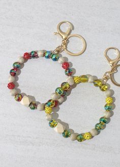 carry your keys and a small pouch in a stylish way with this beaded keychain bracelet great fit around your wrist for an easy wear includes keyring and lobster latch comes in many different color Beaded Keychain Bracelet, Keychain Bracelet, Beaded Keychain, Small Pouch, Rings Bracelets, Beaded Keychains, Small Pouches, Earrings Rings, Trendy Jewelry