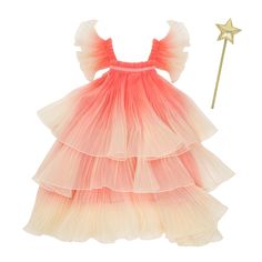 Make a fairy wish come true by gifting this beautiful fairy costume with wings and a wand. It's perfect to wear to parties or for dressing up and hours of imaginative play. Layered pink and ivory pleated ombre organza fairy dress with pink velvet details and a pink polycotton lining. Organza wings are attached to the back of the dress with gold tone snap fasteners and elastic cuffs. Gold adjustable sliders on the straps Gold leatherette star wand with a wooden stick wrapped in a pistachio green Kids Fairy Costume, Make A Fairy, Pistachio Color, Star Wand, Beautiful Fairy, Meri Meri, Fairy Parties, Organza Dress, Rainbow Dress