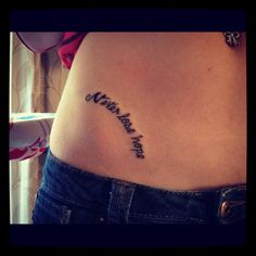 a woman's stomach with a tattoo that reads, i love you to the moon and back