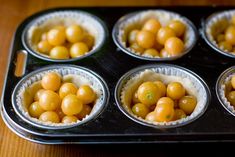 there are many small cupcakes in the muffin tin