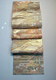 Luxury  Japanese Kimono Fabric Silk Sash Belt Fukuro Obi Crane and auspicious motif Pure silk Gold color Gold thread Six-pass pattern Pure silk Formal Ready-made Kimono obi Length 166.9" Good condition Size inch: 166.9 × 12.2 inches  Materials: Silk Base color: Light gold  *Excellent vintage *Authentic Item from Japan This Kimono sash belt can be also used as luxury table runner, wall decor and other interior accent. Traditional Ceremonial Kimono For Festivals, Traditional Gold Ceremonial Kimono, Traditional Gold Kimono For Festive Season, Traditional Gold Kimono For Festive Occasions, Traditional Silk Kimono For Festivals, Traditional Silk Kimono For Festive Occasions, Japan Decor, Kimono Obi, Wedding Sash Belt