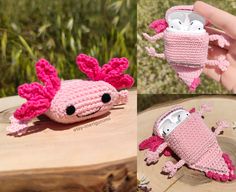 there is a crocheted pink crab with black eyes