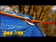 an orange rope on top of a blue tarp with the words quick trick written below it